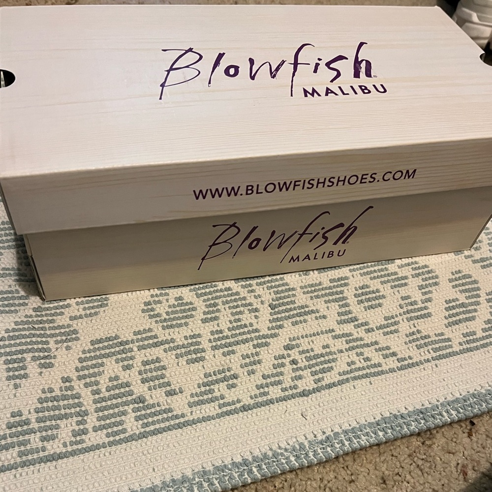 Blowfish slip on sneakers. NEVER WORN! Still in original box and wrapping.